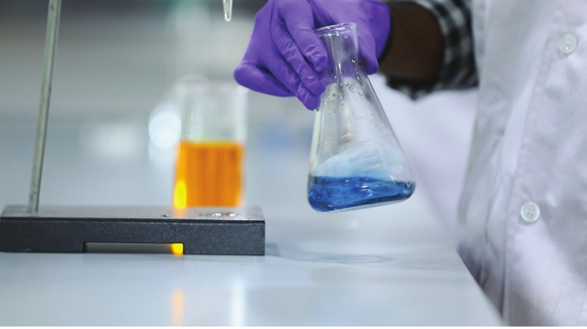 Laboratory technician testing activated carbon quality